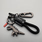 Dije de dinosaurio de aleación de aluminio combinado con una pulsera tejida a mano - 🔥Segundo artículo con un 40 % de descuento