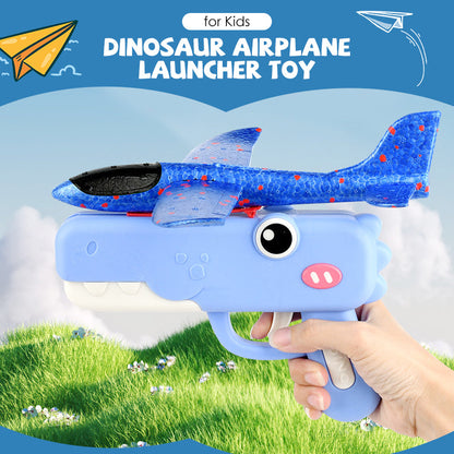 Lanzador de aviones dinosaurio para niños