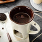 🍫 50% dto. Taza de fondue de chocolate de cerámica con portavelas integrado – mantiene el chocolate a la temperatura ideal. ¡Incluye tenedor de metal y 200 ml! ✨🔥