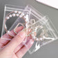 Juego de libros de almacenamiento de joyas transparentes